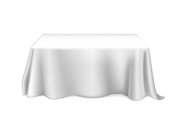 A white table with a cloth on top of it.